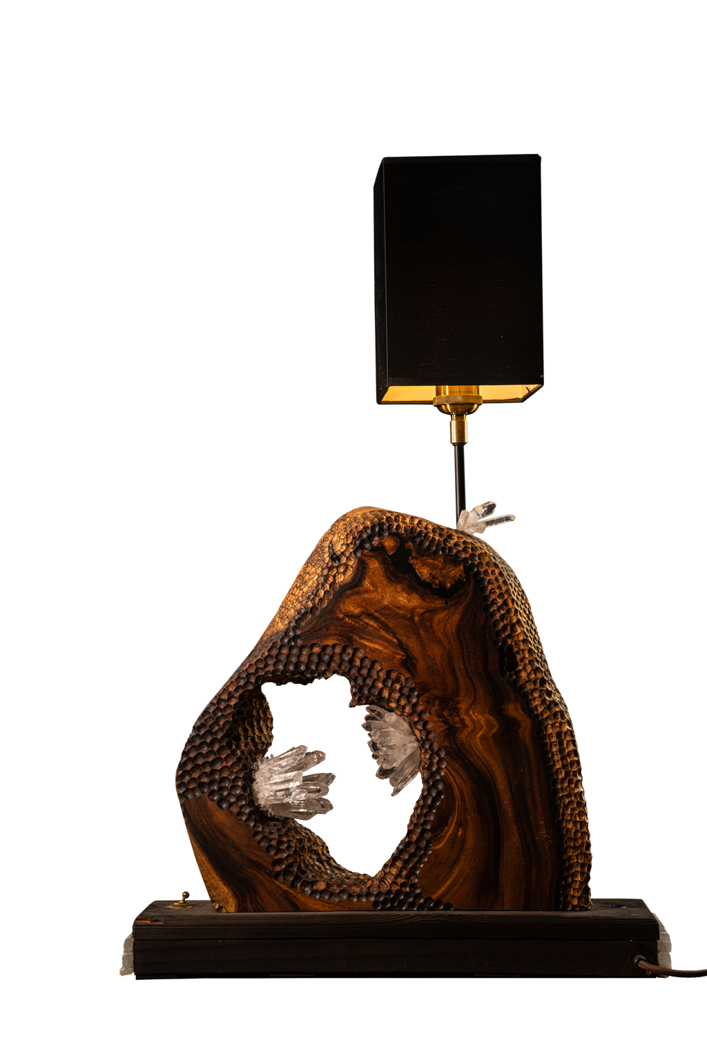 A table lamp with an wood carving